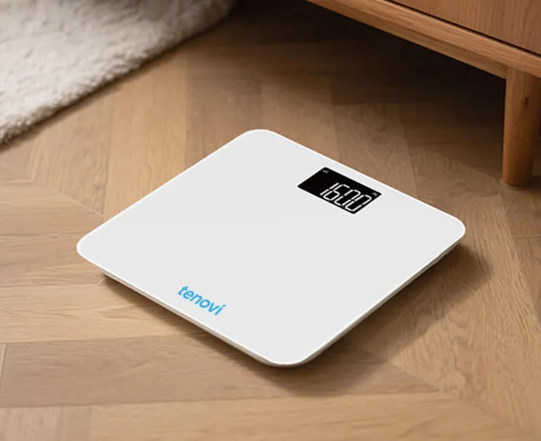 The Tenovi cellular smart scale on a wood floor